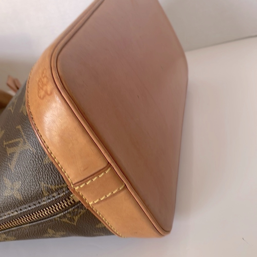 Authentic LOUIS VUITTON Alma Monogram Handbag - Picture 9 of 17